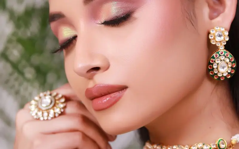 Soft bridal makeup with gold jewellery