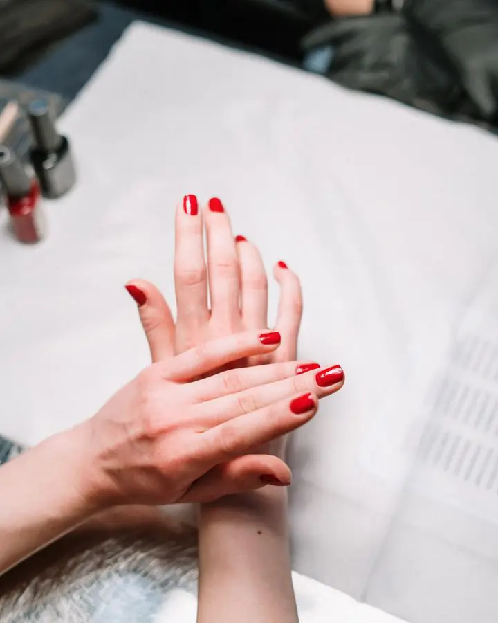 Classic red manicure at the nail station