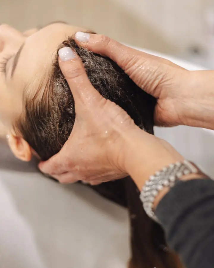 Scalp massage during a hair treatment